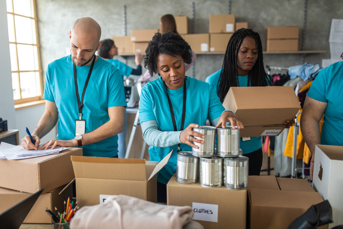 Volunteers packing humanitarian aid